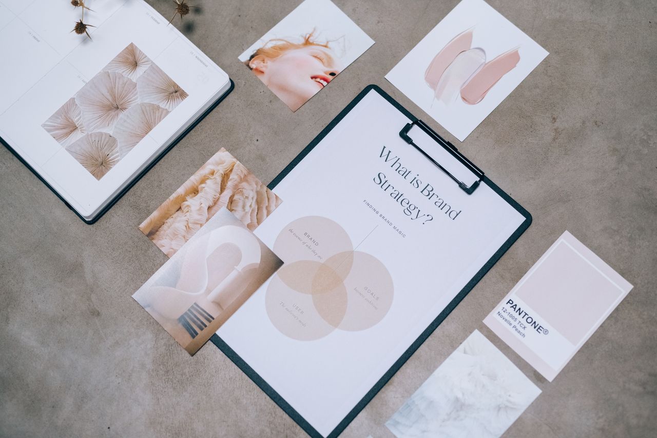 creative-03 Flat lay showing branding materials and design concepts for creative strategy discussions.